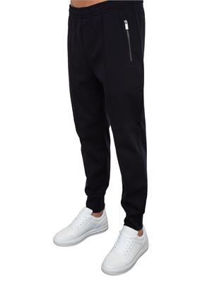 Pantaloni uomo Emporio Armani modello jogger in tessuto punto Roma blu in UOMO