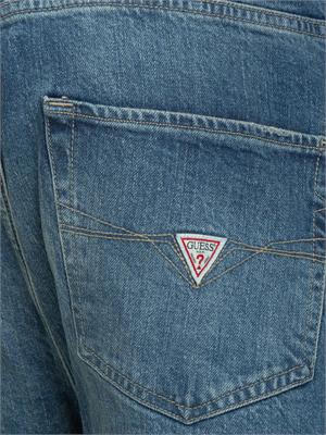 Jeans uomo Guess Jeans con lavaggio medio effetto used e vita media in UOMO