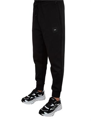 Pantaloni della tuta Boss nero con toppa con logo in UOMO
