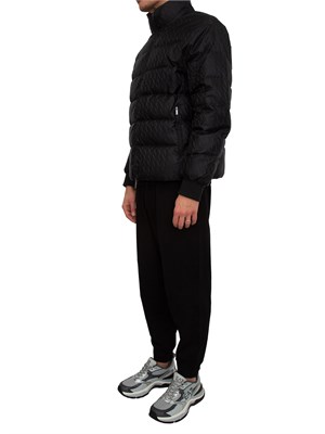 Giubbino uomo Armani Exchange in nylon nero e logo jacquard all over in UOMO