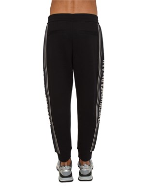 Pantaloni tuta uomo Emporio Armani in double jersey nero con logo jacquard in UOMO