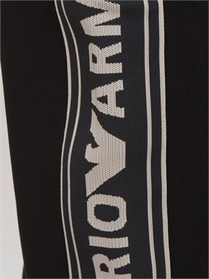 Pantaloni tuta uomo Emporio Armani in double jersey nero con logo jacquard in UOMO