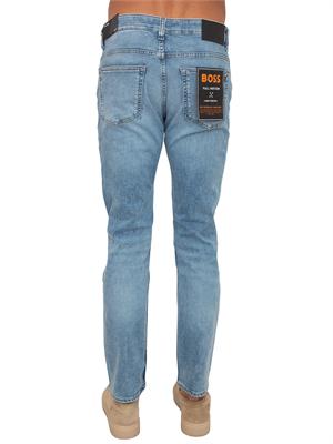 Jeans Boss uomo in denim chiaro effetto used in UOMO