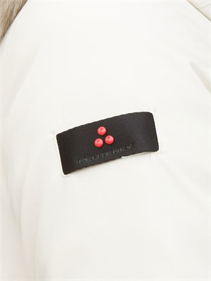 Piumino slim Peuterey con pelliccia in tono colore bianco in DONNA