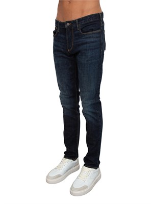 Jeans uomo Emporio Armani in cotone blu scuro e sabbiature in UOMO